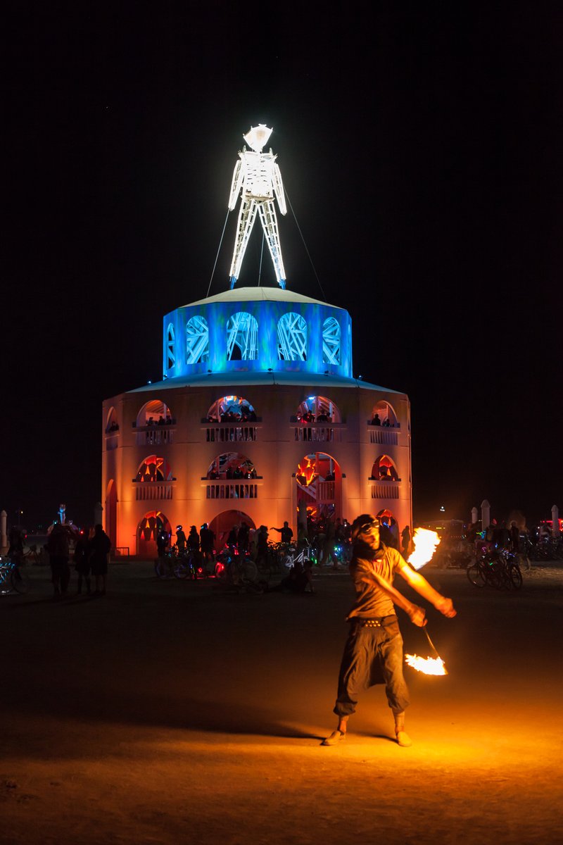 The man and a fire dancer.