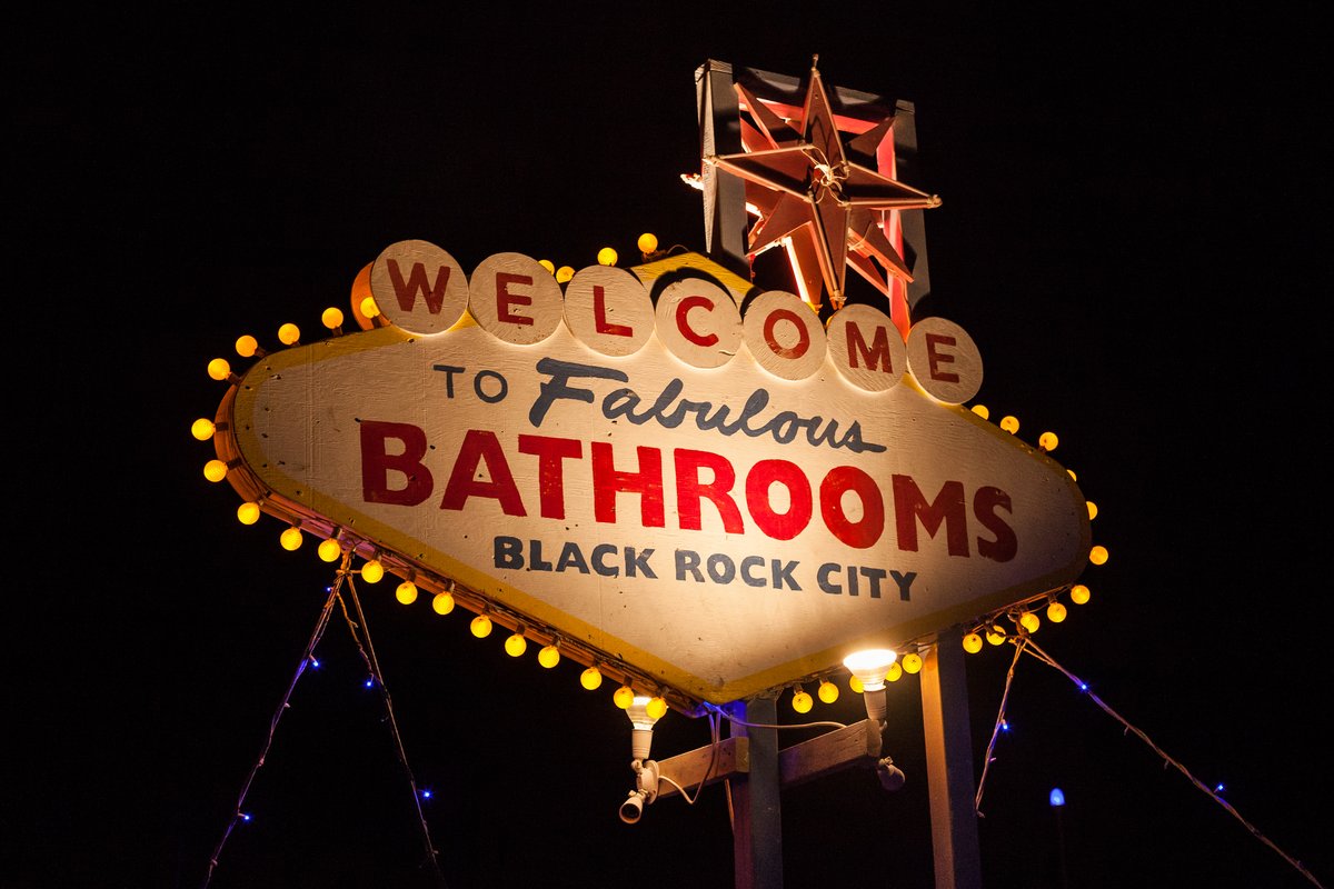 Bathroom signs in the spirit of the famous Las Vegas sign.