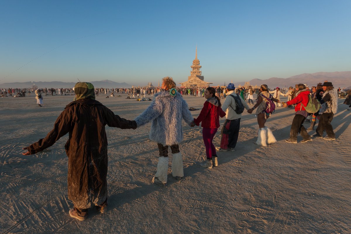 Holding hands at the Temple for sunrise.