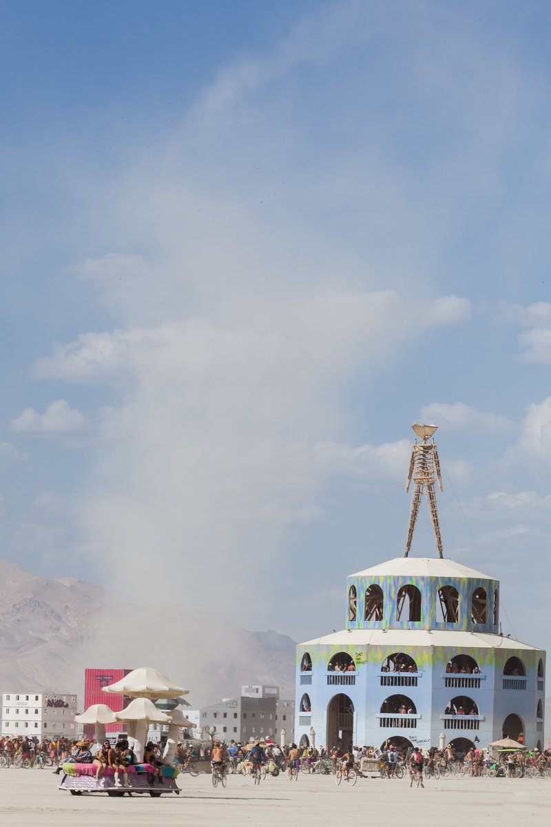 The man and a huge dust devil.