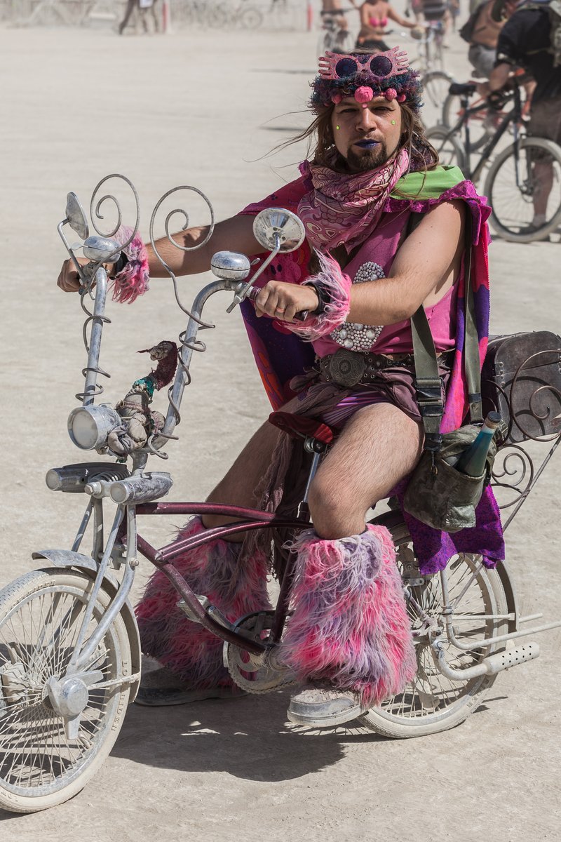 Burner on the Playa with his bike.