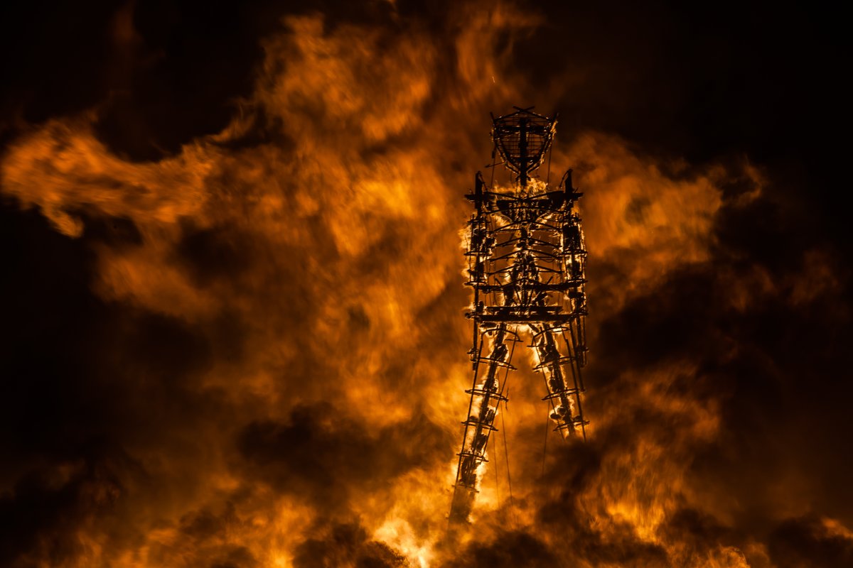 A Lion Of Fire Pouncing On The Man
