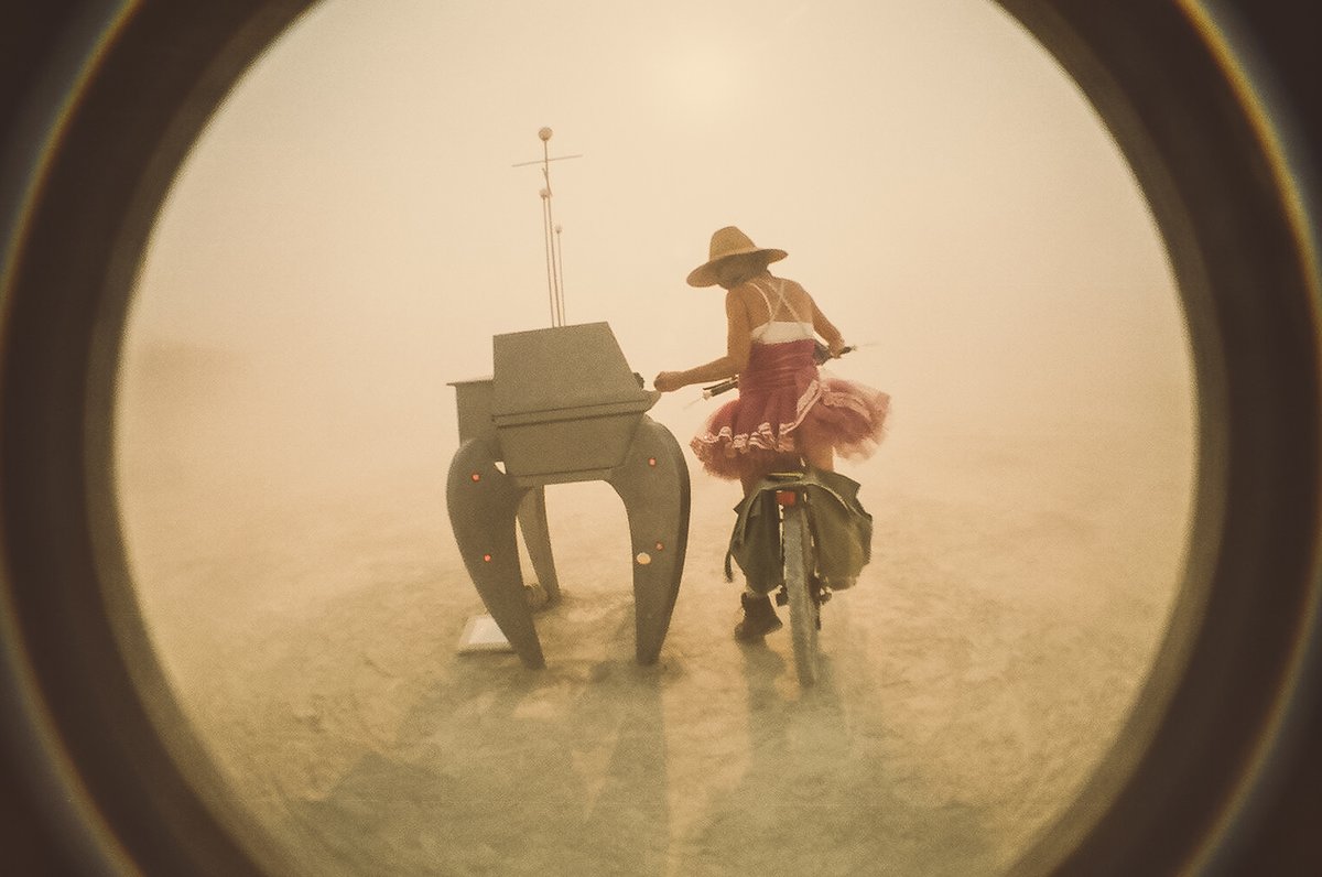 Lady Playing What Looks Like A Space Organ
