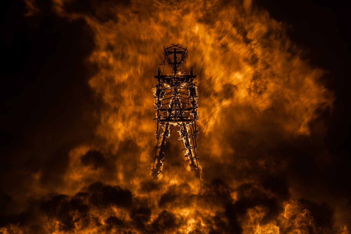 The Man Surrounded By Flames