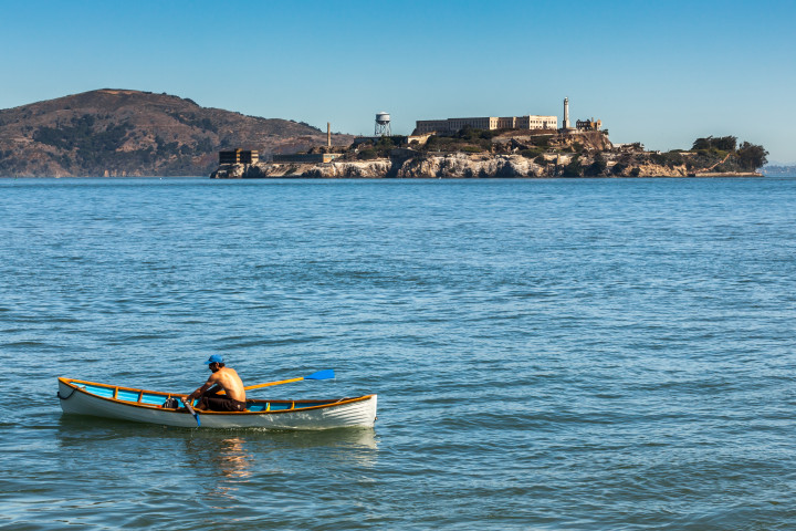 Man Rowing Boat And Alcatraz