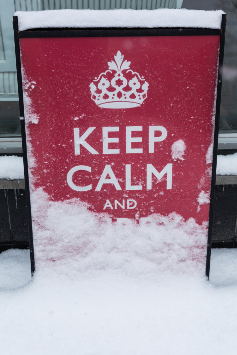 Keep Calm Sign Buried in Snow