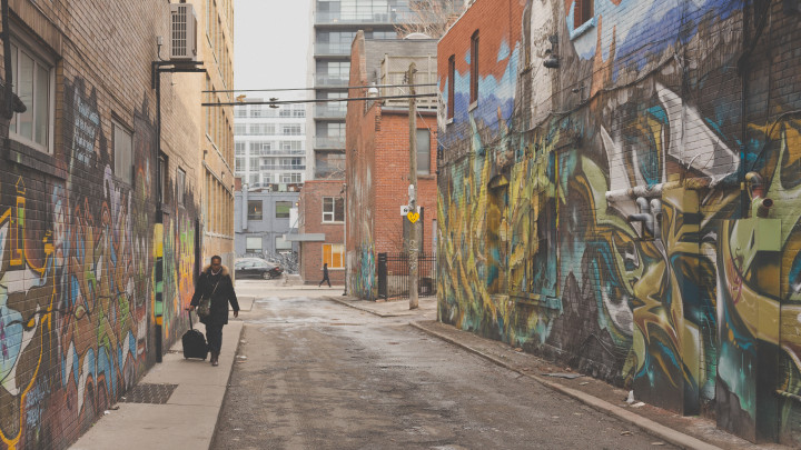 Lady Walking In Alley