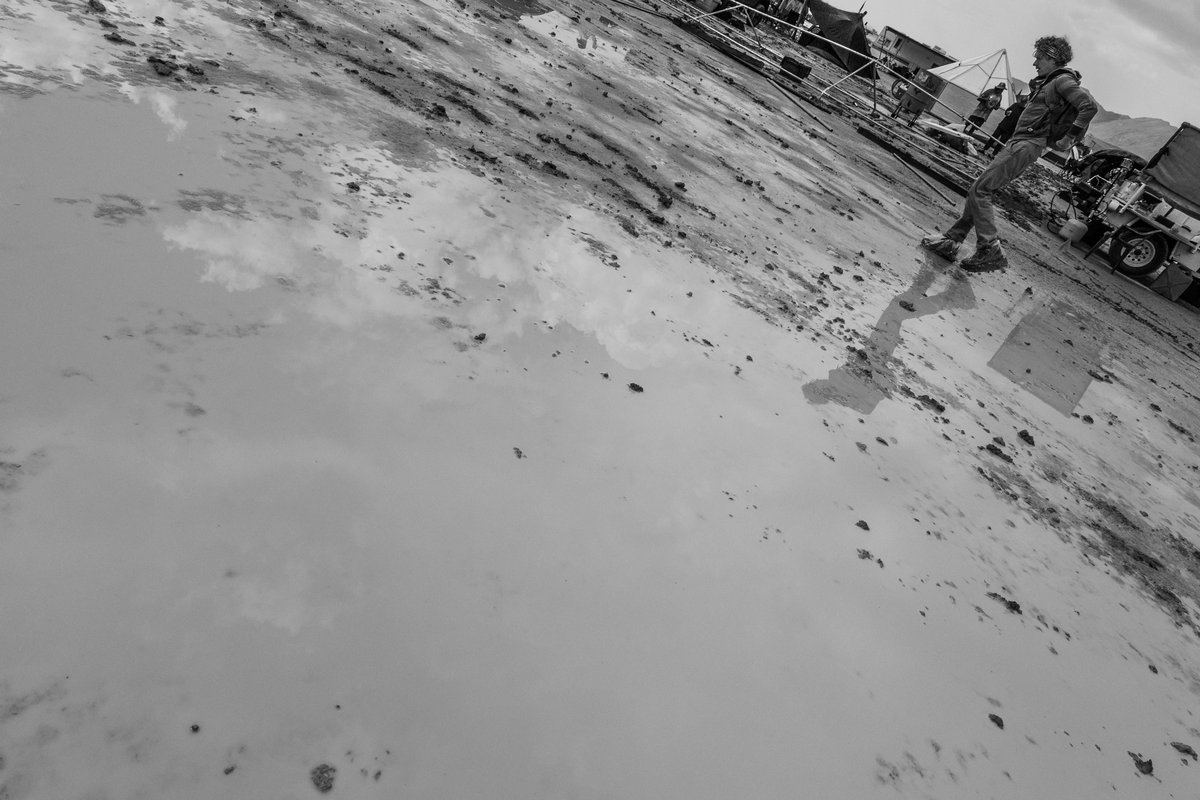 Man And Reflection In Wet Playa Surface