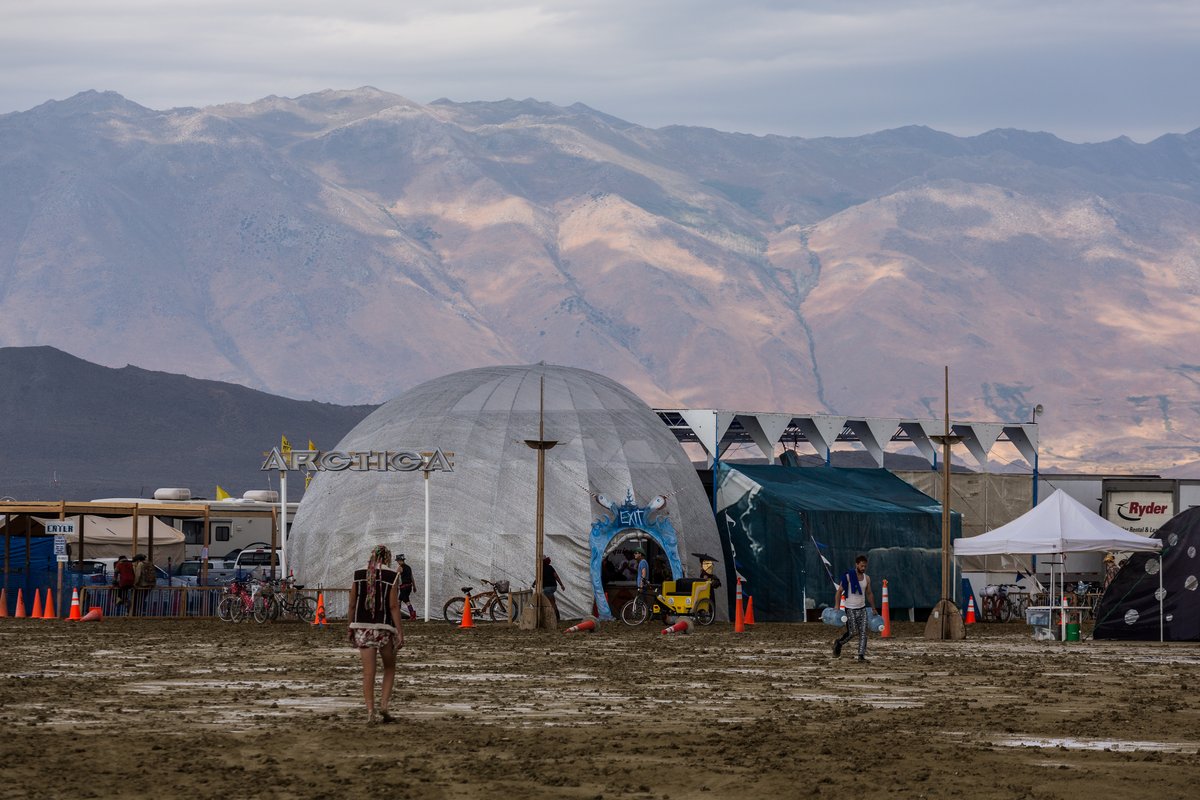 A Few People Walking Around Outside Arctica