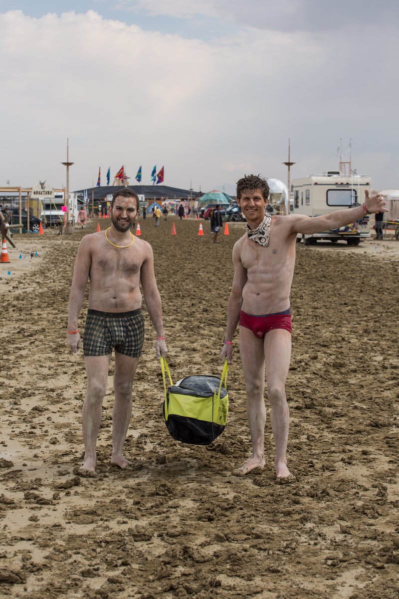 Two Handsome Gentleman On Their Way Back From A Muddy Ice Run