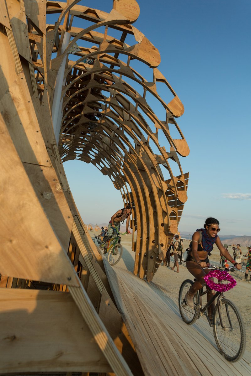 Folks Shredding Up The Cruz the Wave Installation Created by Santa Cruz Burners