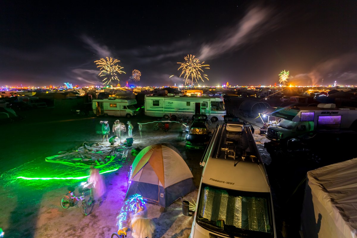 Camp Awesomesauce Being Built As Fireworks Go Off In The Distance (View from ~6:50 and E)
