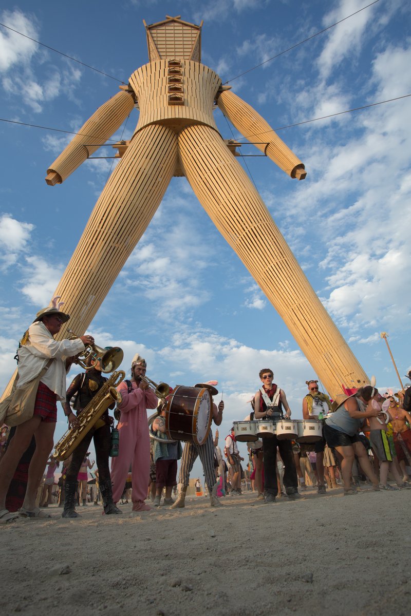 Musicians Perform Under The Man
