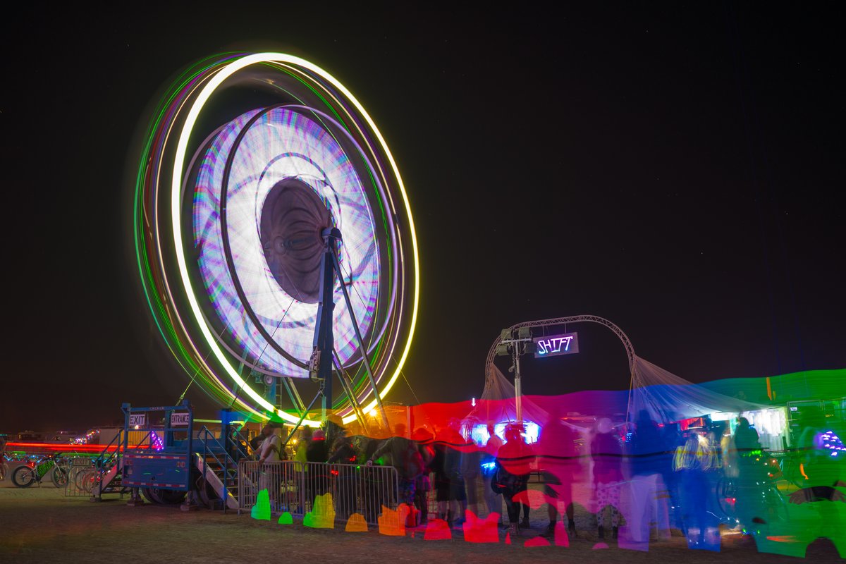 The Wheel of SHIFT by K & C (I was trying to create an effect where it appeared I was getting on the ferris wheel here with the light painting. Turned out ok I guess?! Thanks to Musick for letting me know in the comments. #)