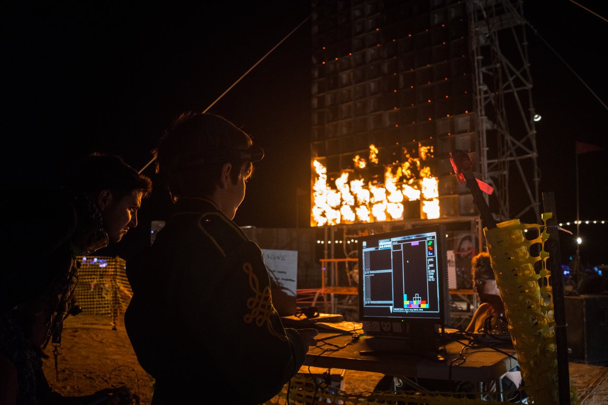 A Boy Plays The Epic Fire Tetris by Jody McIntyre info@firetetris.com http://burningman.org/event/brc/2015-art-installations/#FireTetris