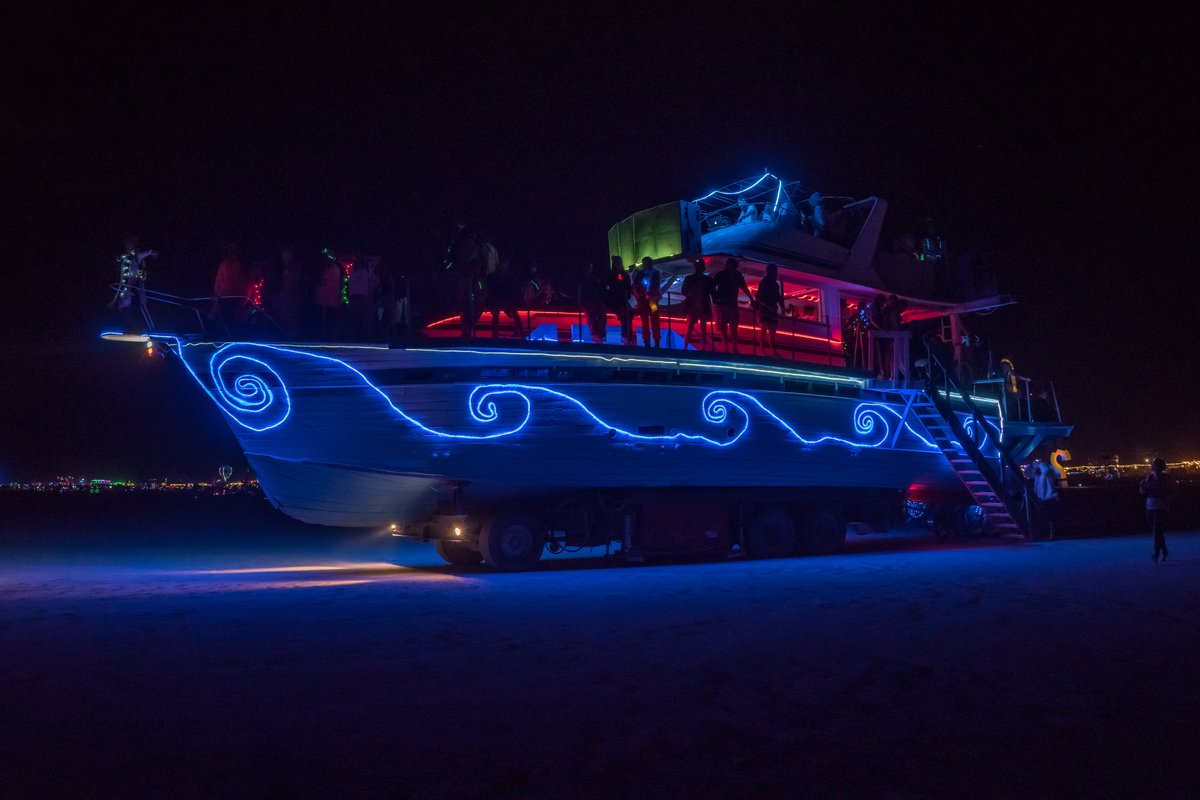 The Famous Christina Yacht Cruising The Playa At Night