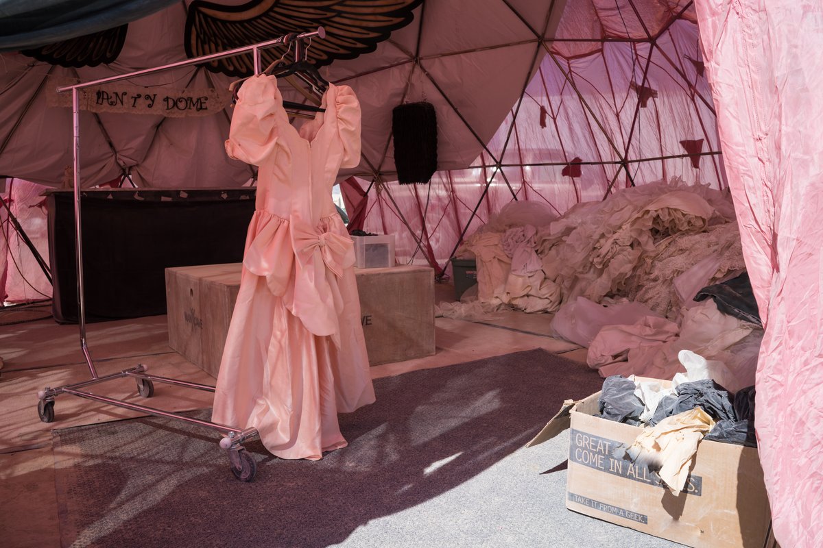 Wedding Dresses Strewn About Inside The Panty Dome