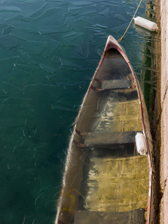 Sinking Canoe Under Ice