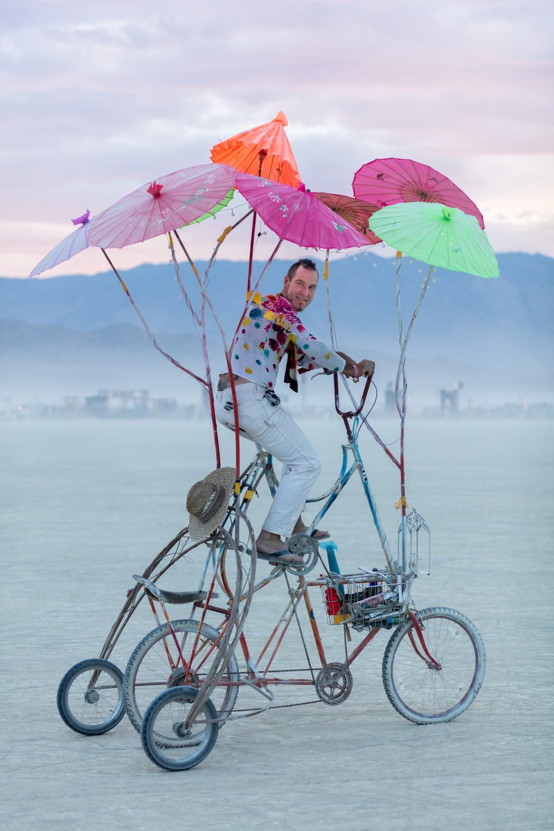 Burner On A Bike With Cool Umbrellas