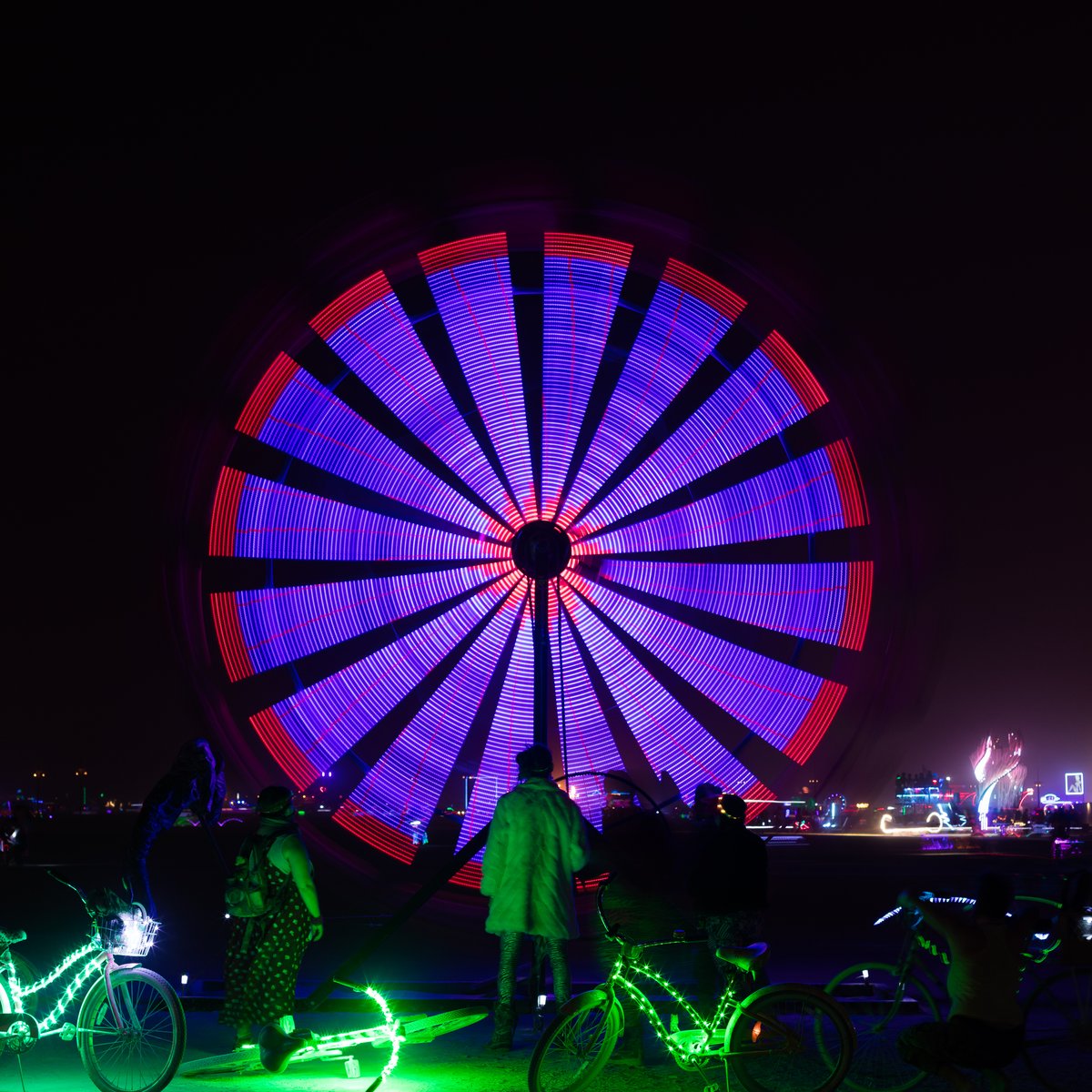 Name Unknown (it's the one with the umbrella's that is like a mini ferris wheel)