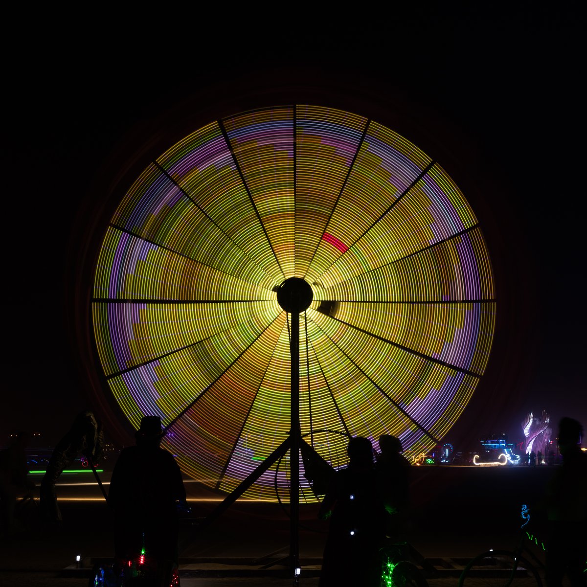 Name Unknown (it's the one with the umbrella's that is like a mini ferris wheel)