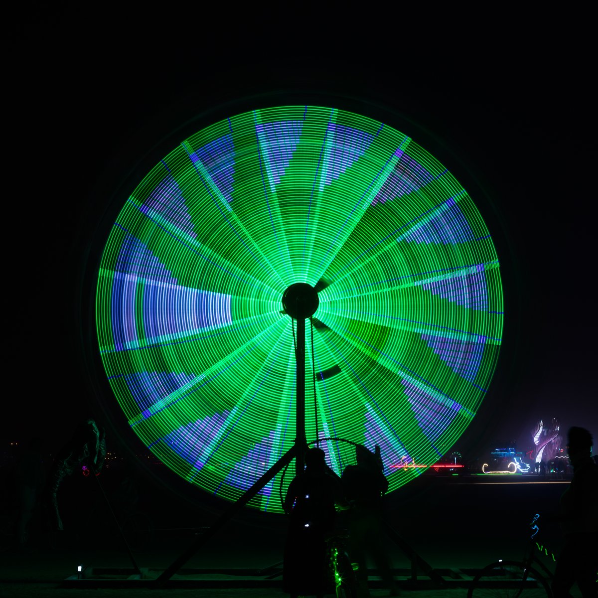 Name Unknown (it's the one with the umbrella's that is like a mini ferris wheel)