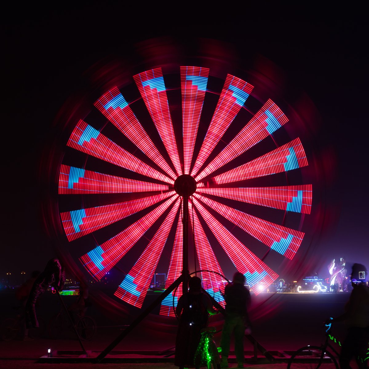 Name Unknown (it's the one with the umbrella's that is like a mini ferris wheel)