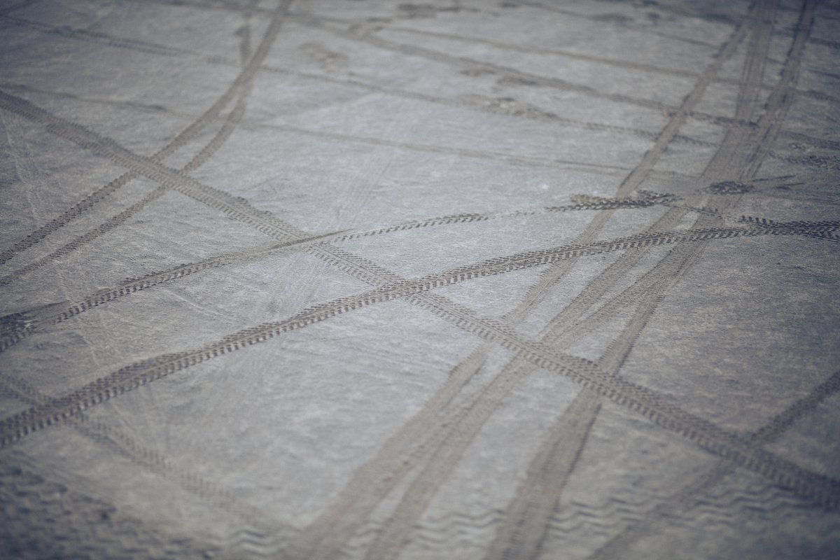 Bike Tracks In The Playa Surface. (One of my mini projects this year was supposed to be to shoot some blank playa templates for artists to use in their future mockups. It didn't happen but this was supposed to be part of that series. Isn't funny how you always have grand plans and the reality of the playa washes them away.)
