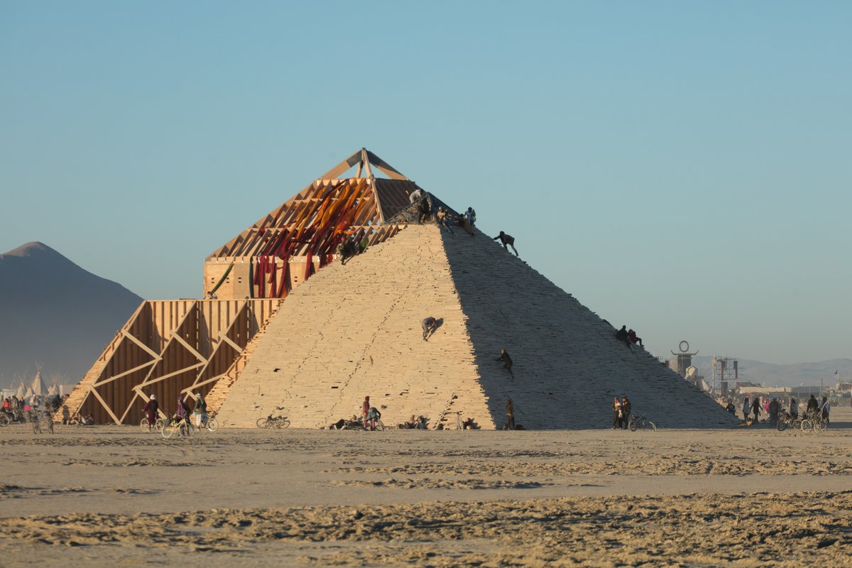 Burners Climb on The Catacomb of Veils by Dan Sullivan and the Catacomb Crew at Sunrise (I tried to blend the mountain and both pyramids into one here)