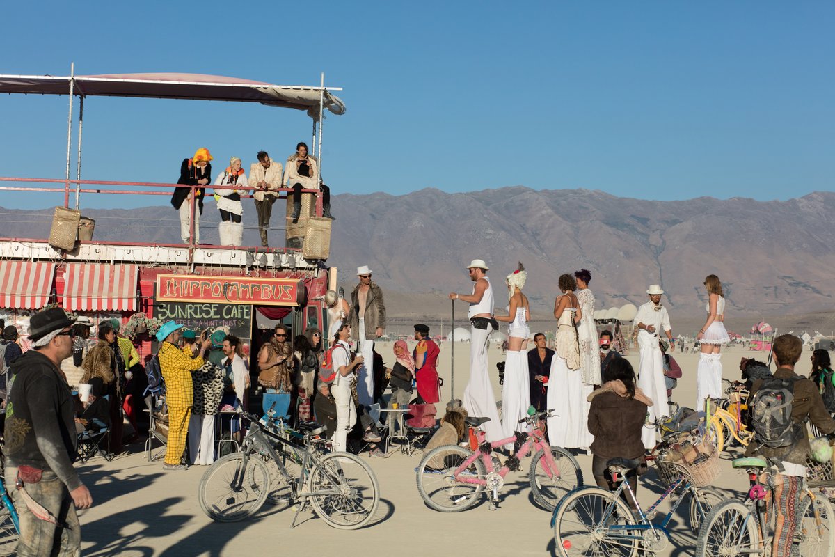 Sunrise Cafe Hippocampbus and folks on stilts
