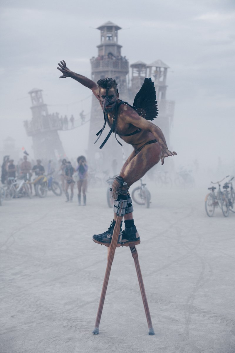 Man On Stilts. Not sure of his name. If you know please or just send this to him.