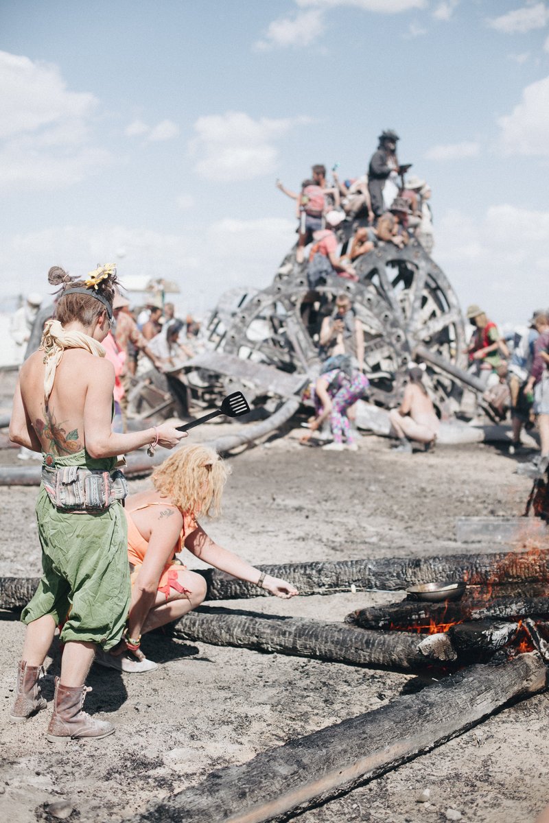 Roasting Marshmallows And Cooking Breakfast On The Man's Embers