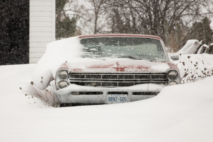Old Car In The Snow