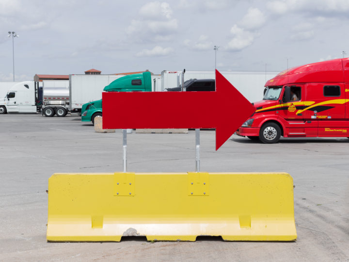 Red Arrow And Yellow Jersey Barrier