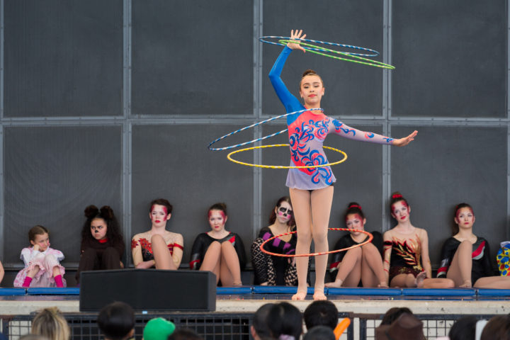 Girl On Stage With Hula Hoops