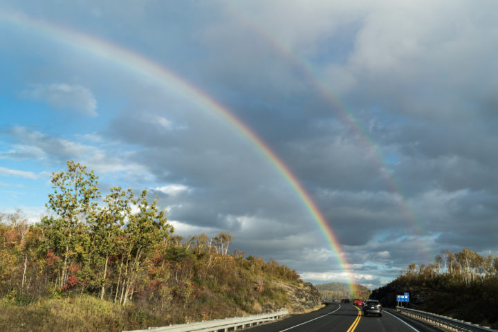 Curved Road And Rainbow