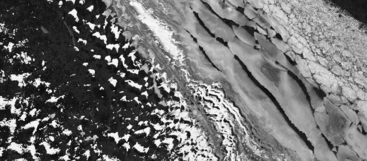 Ice Breaking Up Into Small Pieces
