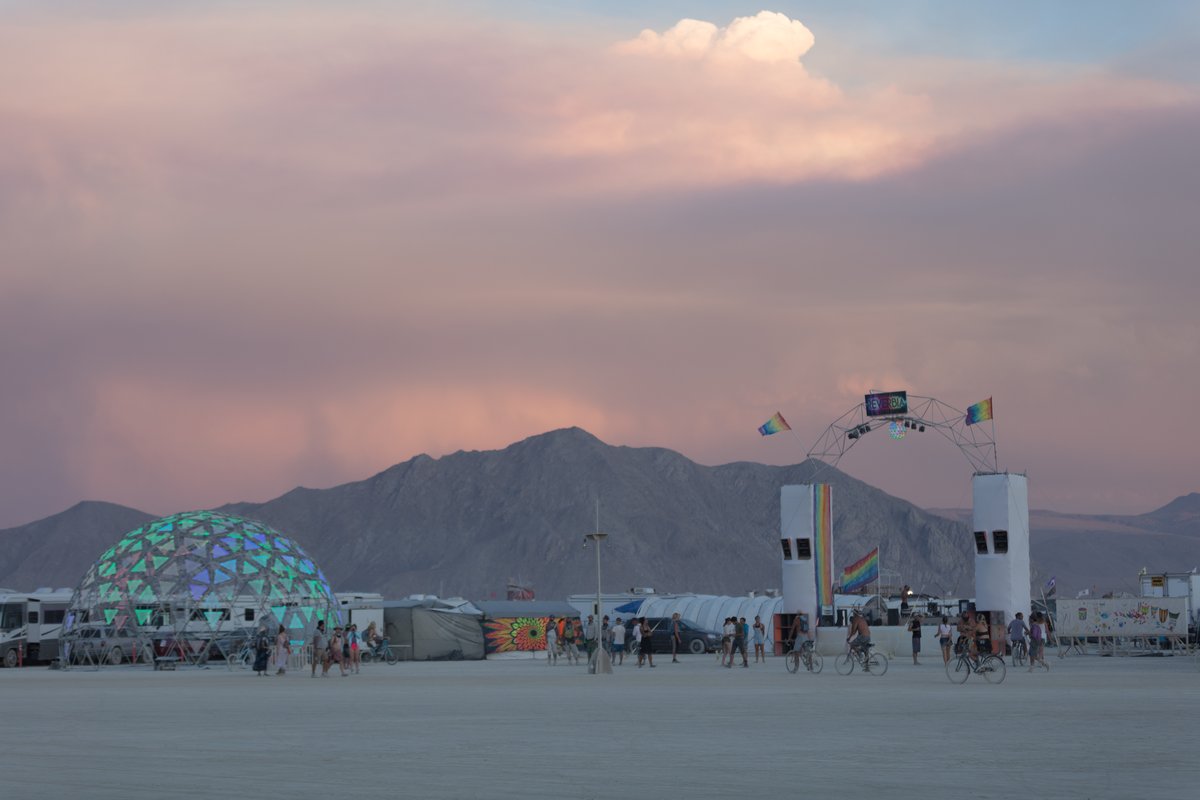 According to Henni #428 is Reverbia's frontage on the Esplanade, featuring two more of our main live music stages: The Radiance Dome (panelled with sound-reactive LEDs by Light At Play) and our Main Stage.