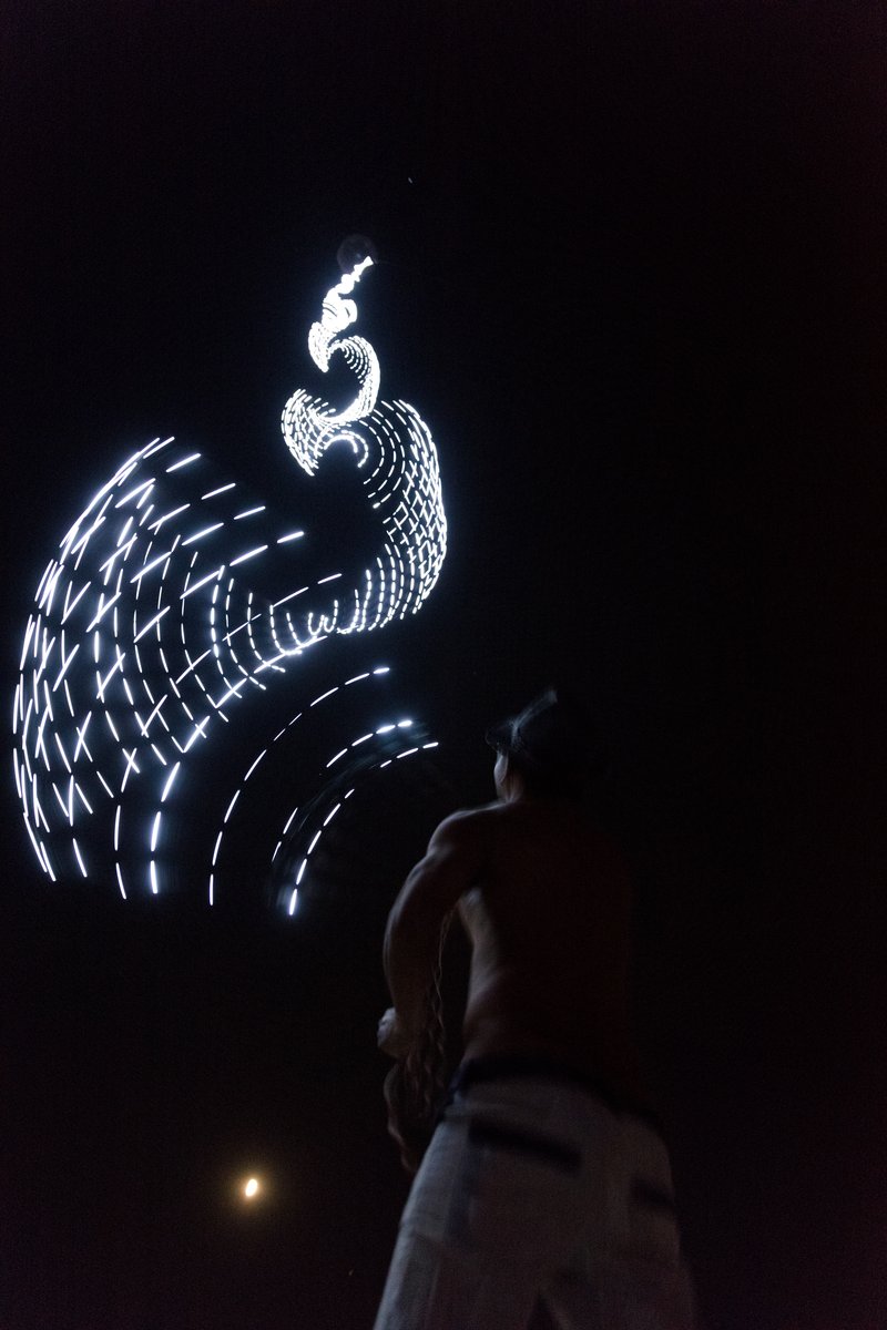 Burner Playing With Balloon With Long String Of LEDs On It (piece called Beanstalk by David Rattray. Thanks to Shane S for the caption update)