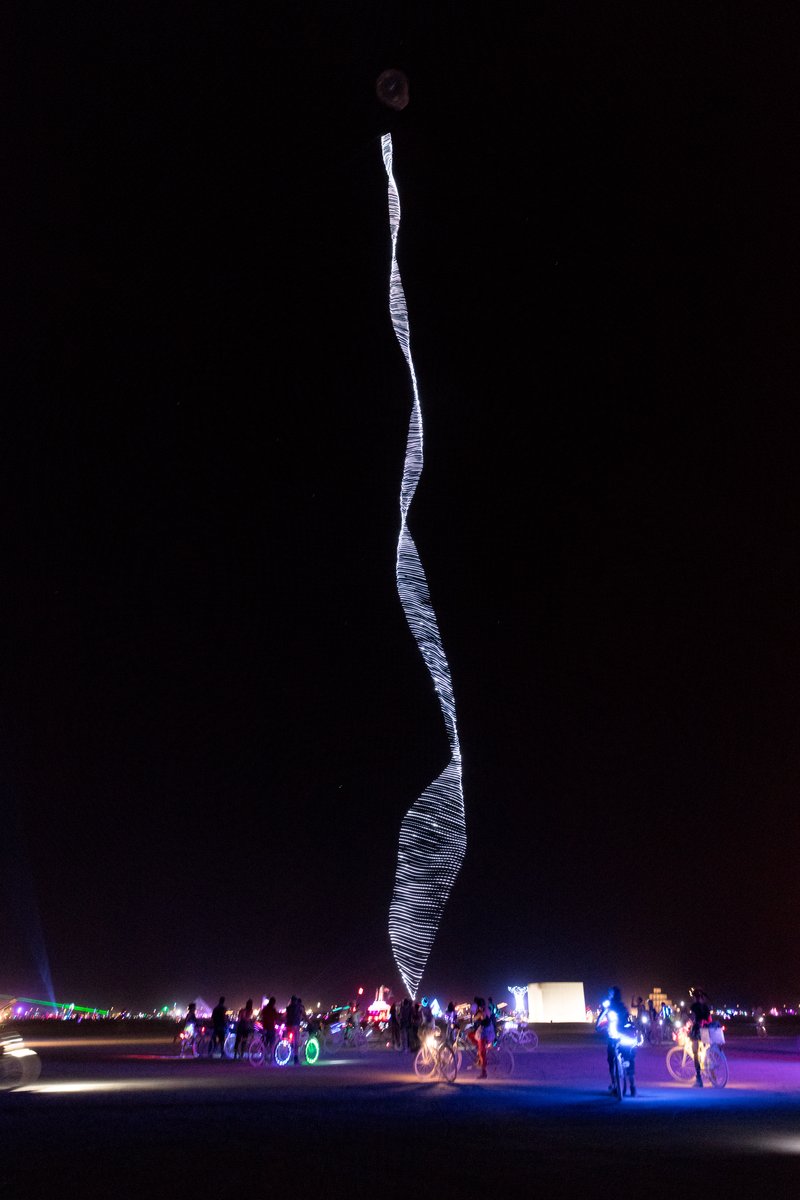 Burner Playing With Balloon With Long String Of LEDs On It (piece called Beanstalk by David Rattray. Thanks to Shane S for the caption update)