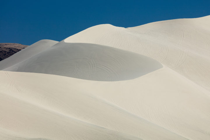 Tire Tracks On Sand Dunes