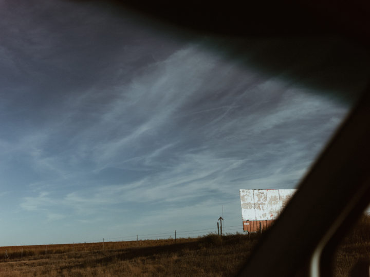 Empty Billboard Through Windshield