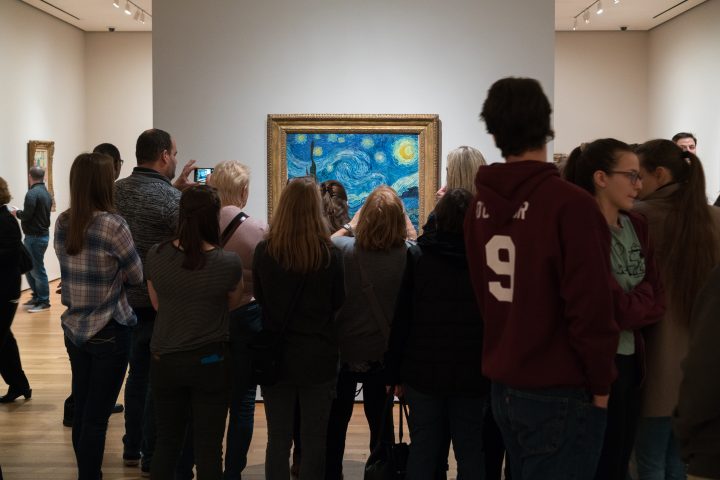 Museum Visitors Crowded Around The Starry Night