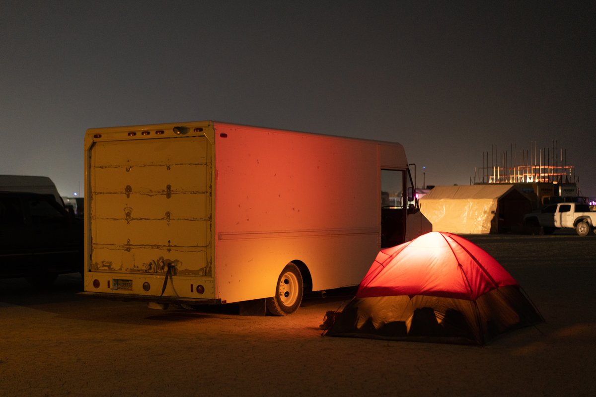 A tent and a delivery truck. Nice.