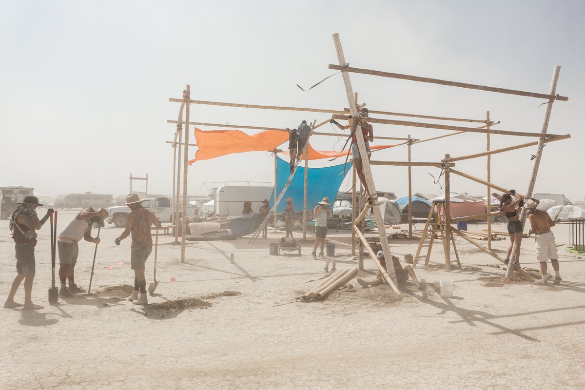 Burners building their camp structure.