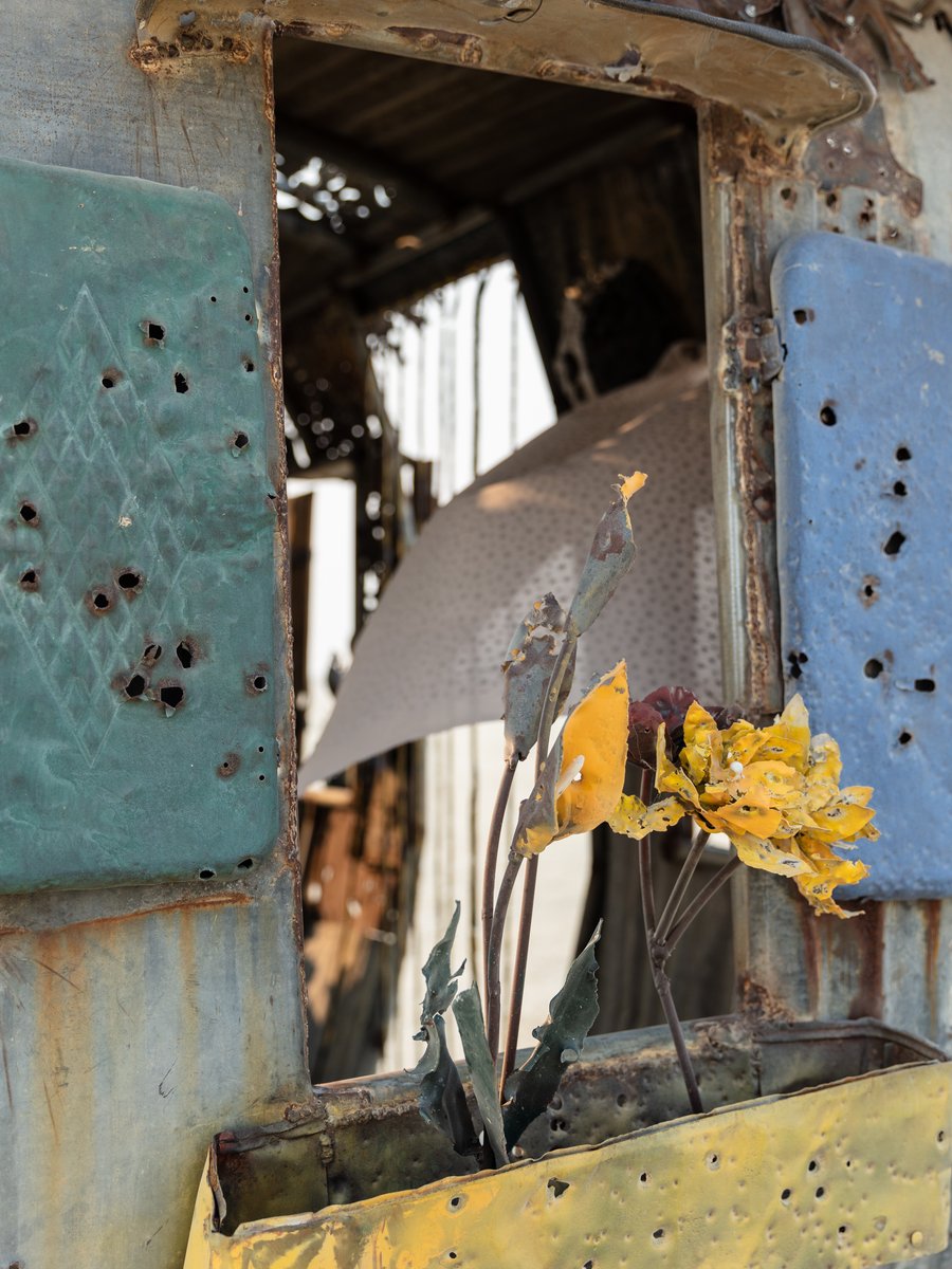 The Little Schoolhouse of Hope and Fear by: Gratis from: Vista, CA year: 2018 If all you had was the rough detritus of war, the cheap rubble of constant calamity, what would you build with it? A bunker, a church, or a school? Would you create a place of hope or fear? Of the past or for the future? Hope rising up from a violent and chaotic past, Fear transformed into building blocks: found metal, often riddled by gunre, torn by the wind and baked by the desert sun are incorporated into this replica of the traditional "little red schoolhouse." The Little Schoolhouse of Hope and Fear stands on the playa as a beacon to those who wish to teach a better way for the future, or to those ready to learn from the failures of the past.