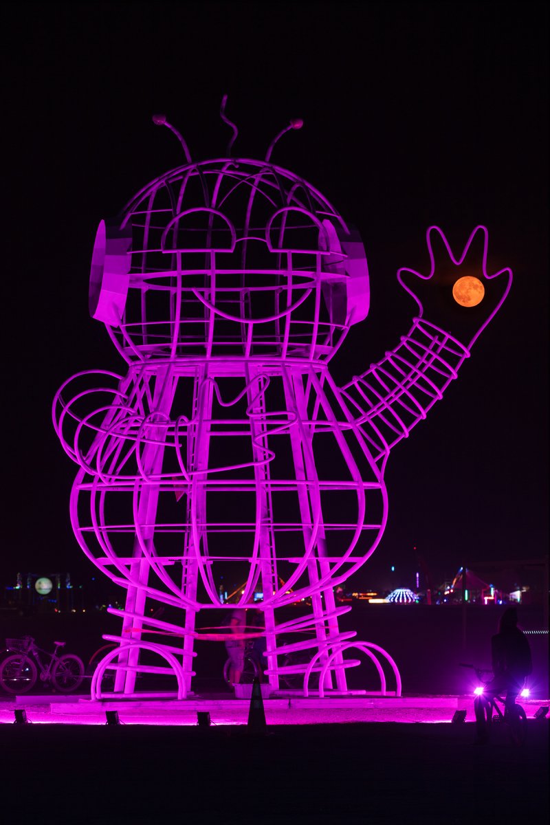 BEBOT by: Andrea Greenlees, Andy Tibbetts and Josh Haywood from: Surbiton, Surrey, England year: 2018 (I was out photographing this piece and one of the artists/collaborators came over to say hi. There was a really bright light making this image impossible so I asked them to shut it off for a minute. They turned off the light and this photo is the result. I hope this photo finds them. If you see me out there let's collaborate to make a nice image of your art!)