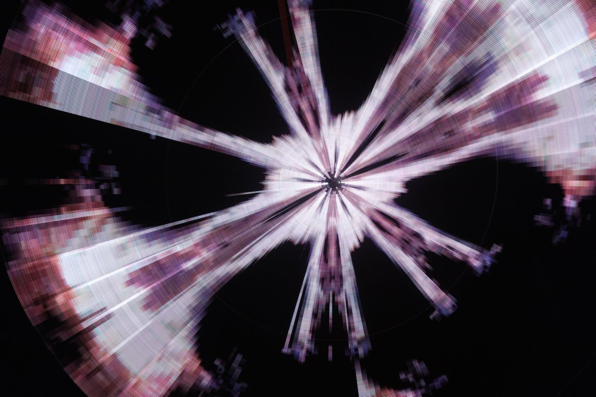 Paraluna by: Christopher Schardt from: Oakland, CA year: 2018 Paraluna combines kinetic sculpture, LEDs and music. Its main component is a disc 10m in diameter with 17,280 LEDs. A computer controls the LEDs while rotating, raising, lowering, and tilting the disc. Some of the LED patterns work with the rotation of the disk, creating spirals. Others use persistence-of-vision, making an image hover in space above the spinning LEDs. Spokes demonstrates both of these styles: https://photos.app.goo.gl/DcP9IauNTjRHENUh2 Surrounding the disc are several high-quality speakers that play classical music at comfortable, yet immersive volume, creating a comfortable, peaceful place to be. Patterns are chosen to complement each musical piece, as with Firmament: https://photos.app.goo.gl/H6KCzkf5jkGWAA3m2