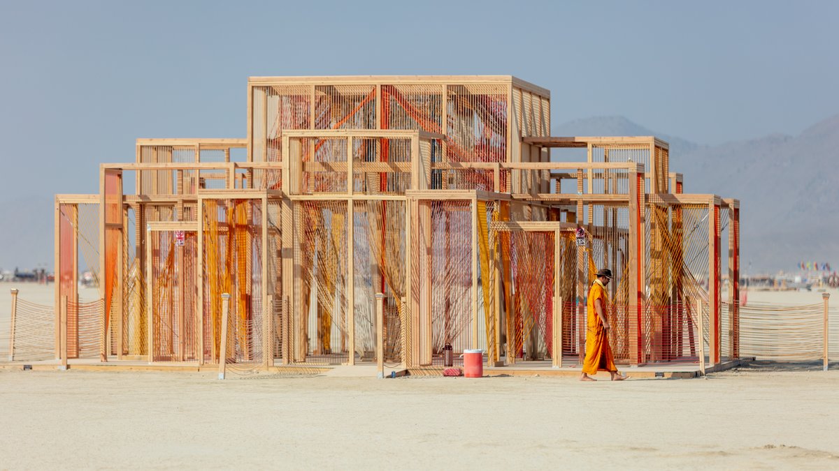 Trace by: Kate Greenberg from: San Francisco, CA year: 2018 Inspired by the interconnectivity and ephemerality of the playa, Trace is an installation of colored rope that weaves into a mirage-esque form above the dust. This art piece reflects on the way Black Rock City teases our perception of reality as we generate and explore it together, like a shared dream. It celebrates how individual journeys cross paths in the dust, yet altogether intertwine to shape an evanescent landscape and its broader community. URL: https://www.facebook.com/traceplaya/