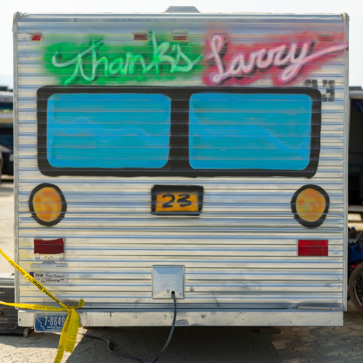 Like many things at Burning Man, I am confused by this. Not the Larry part, the painted on windows.